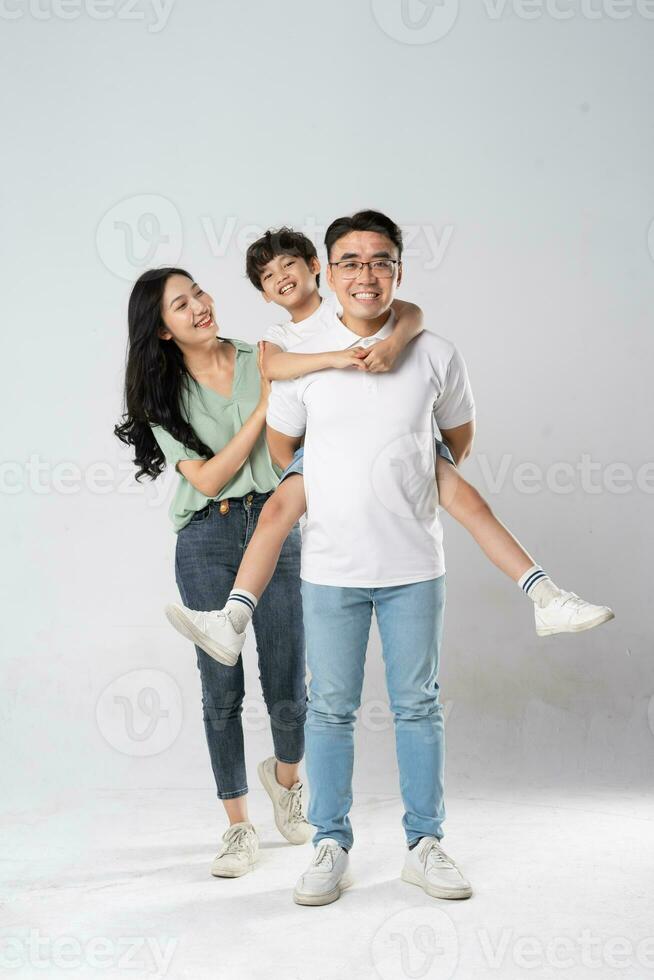 a family posing on a white background photo