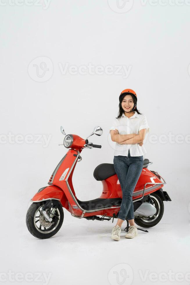 full body photo of a woman wearing a hairdresser and driving a motorbike