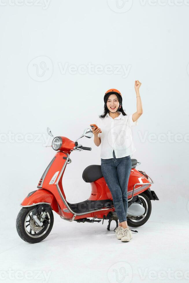 full body photo of a woman wearing a hairdresser and driving a motorbike