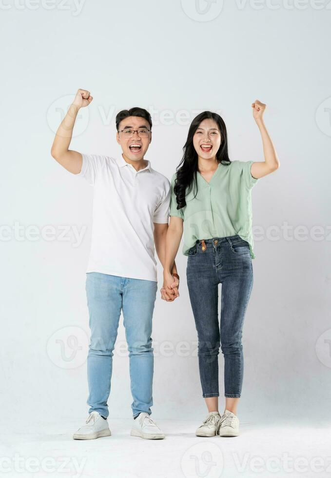 a couple posing on a white background photo