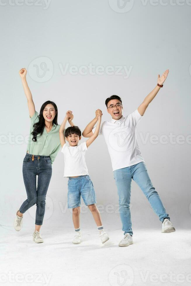 a family posing on a white background photo