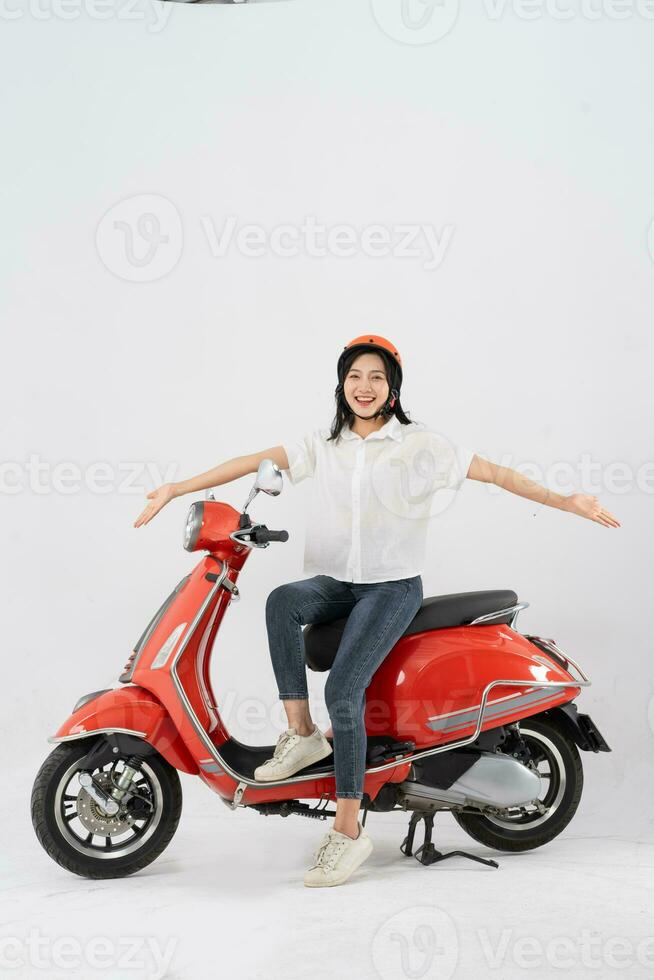 full body photo of a woman wearing a hairdresser and driving a motorbike