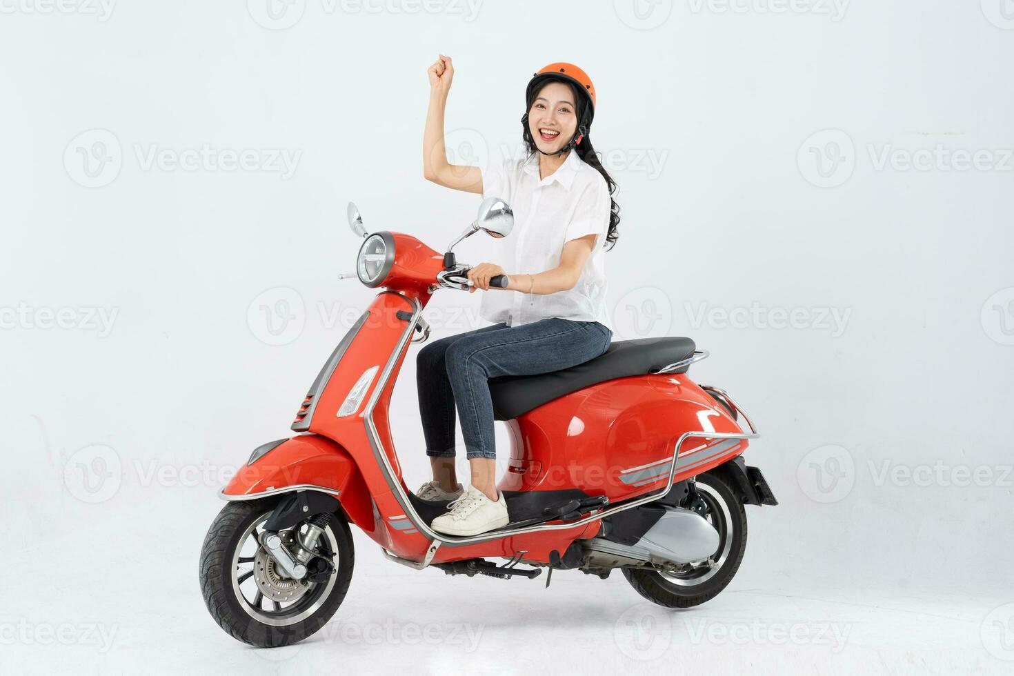 full body photo of a woman wearing a hairdresser and driving a motorbike