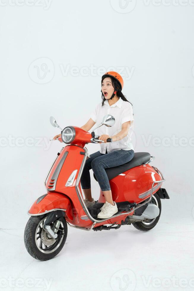 full body photo of a woman wearing a hairdresser and driving a motorbike