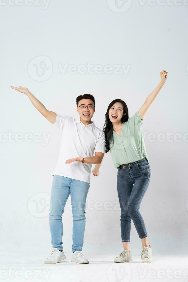 a couple posing on a white background photo