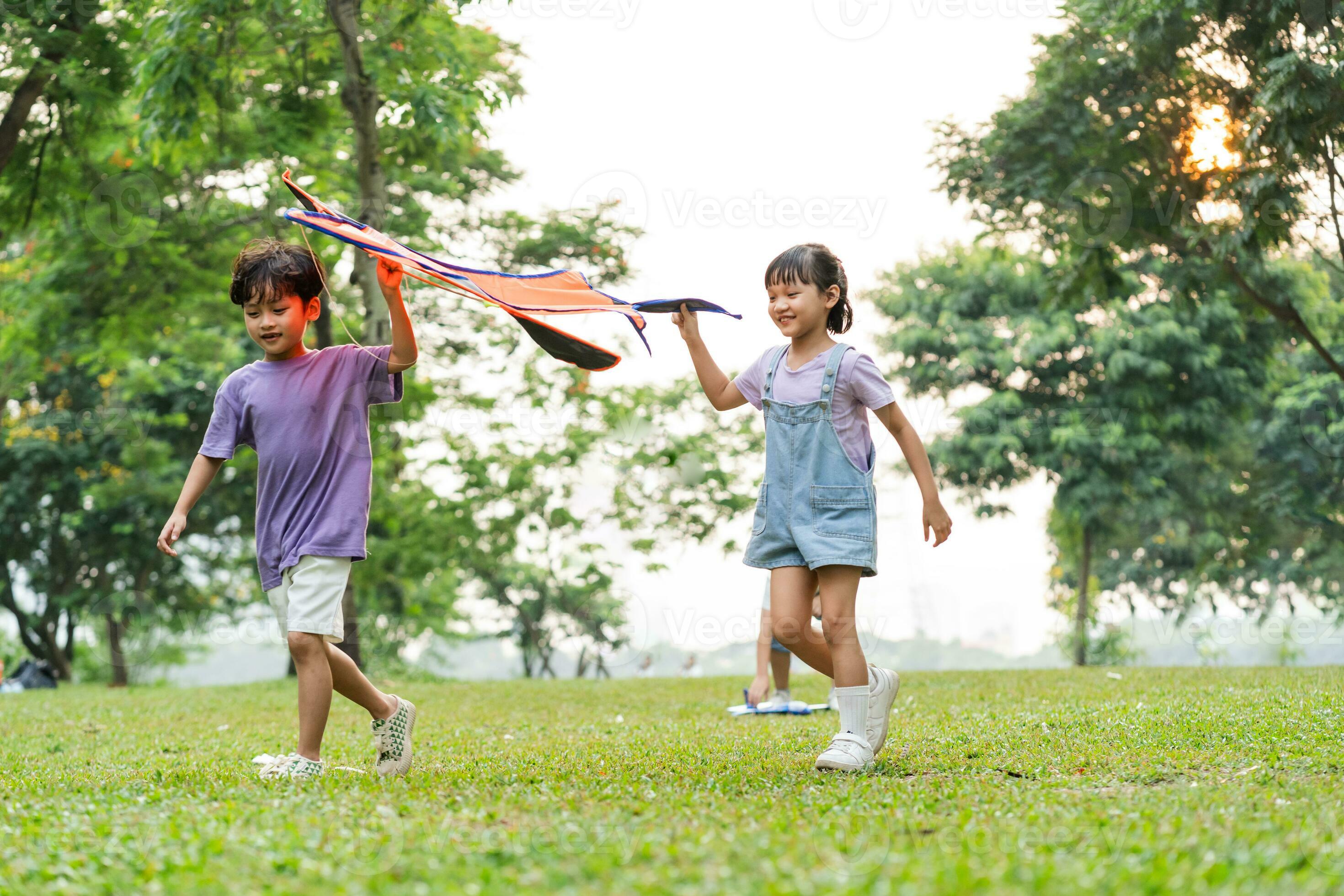 group image of cute asian children playing in the park 26702357 Stock Photo  at Vecteezy