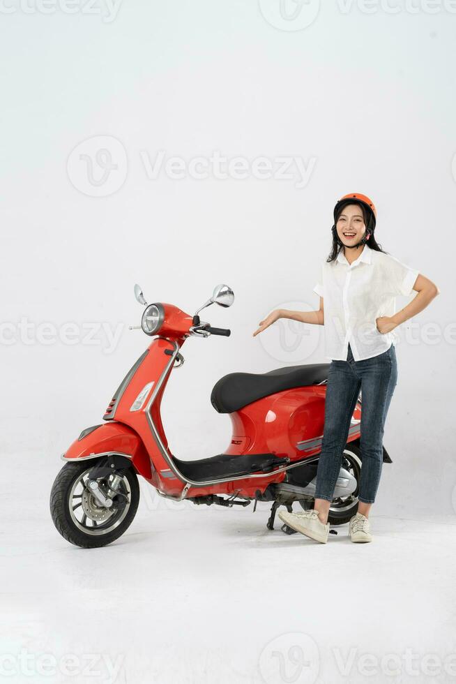 full body photo of a woman wearing a hairdresser and driving a motorbike