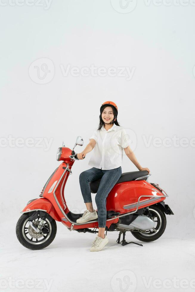 full body photo of a woman wearing a hairdresser and driving a motorbike