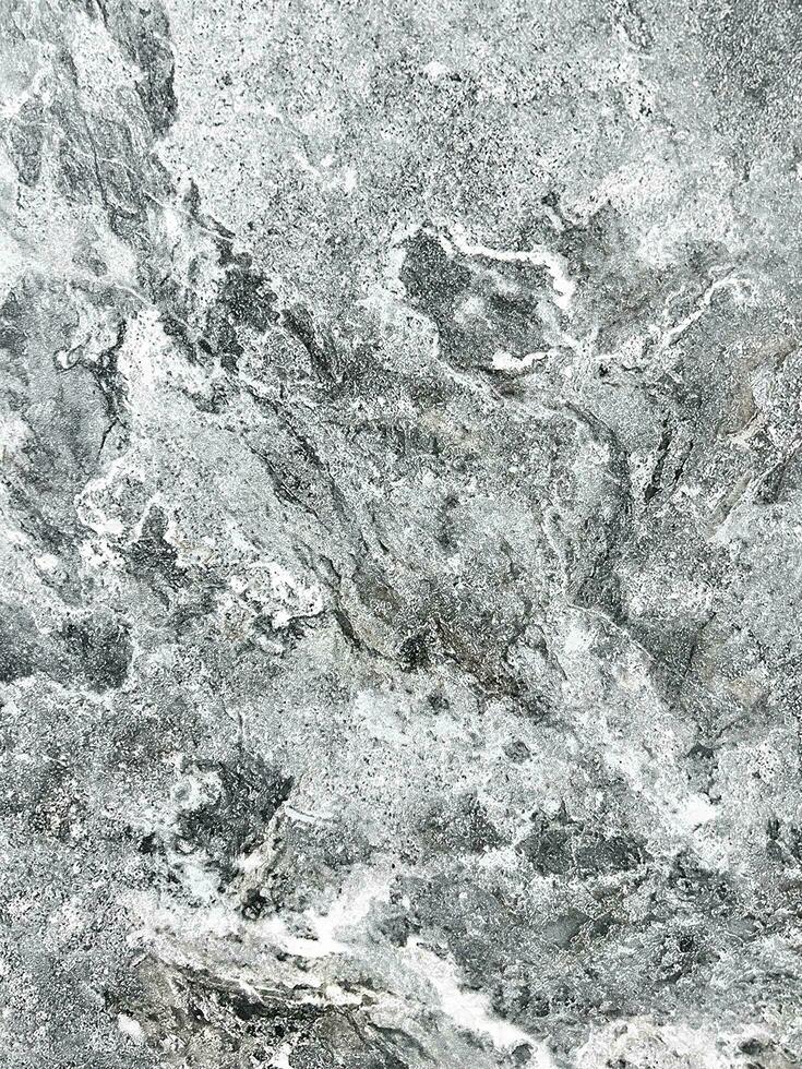 The texture of the stone. Scuffs. Stone background. photo