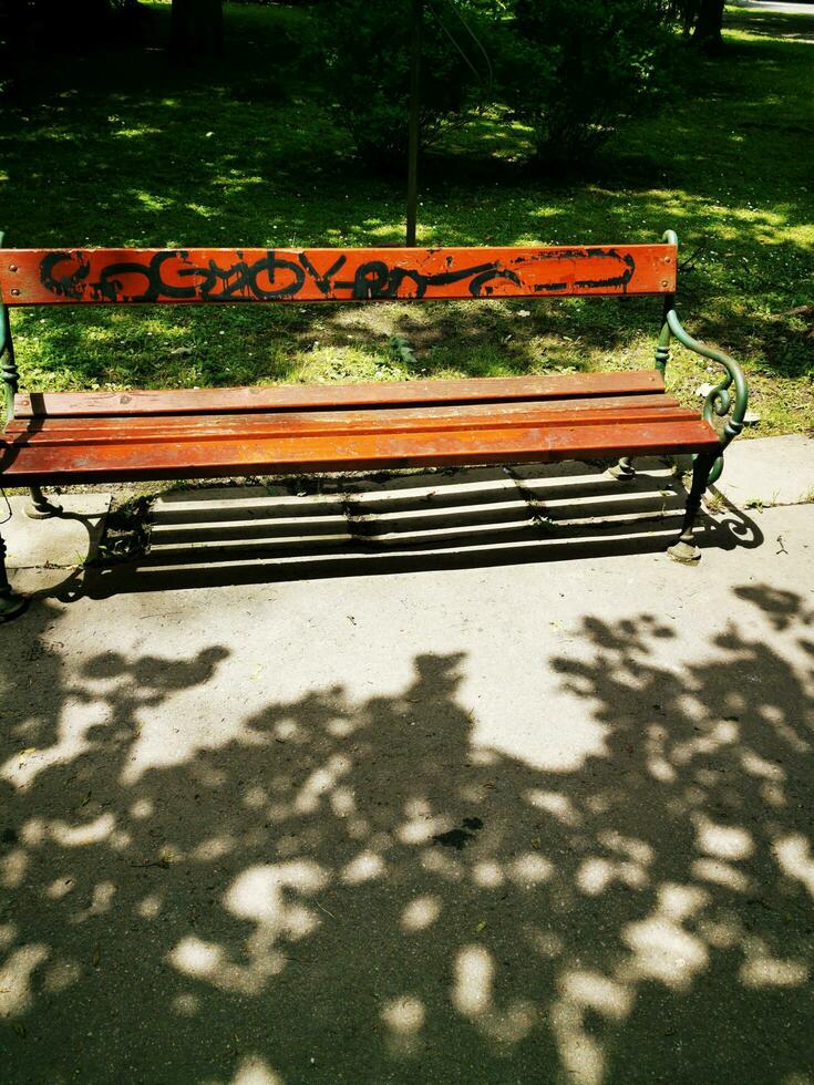 LILLAFURED,HUNGARY-06.14.2020. Wooden bench located in Miskolc-Lillafured photo