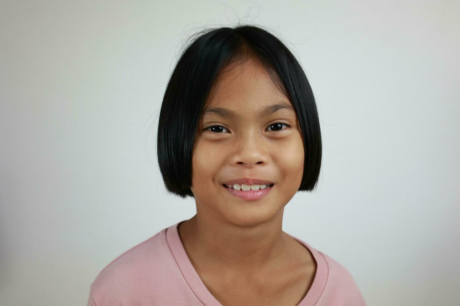 Portrait of child on the grey background photo