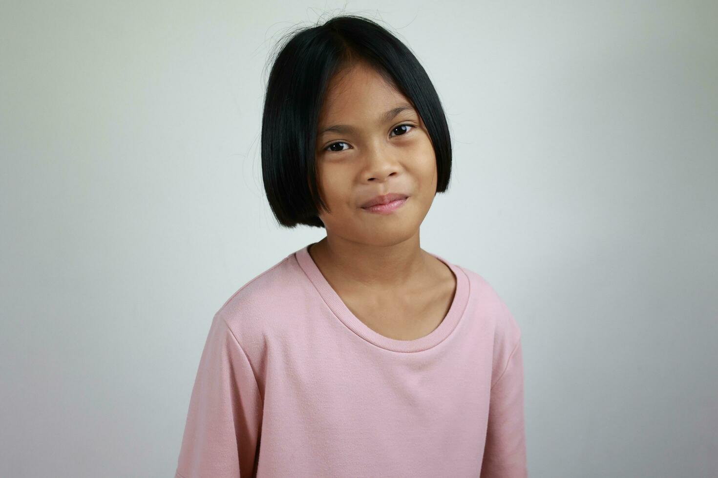 Portrait of child on the grey background photo
