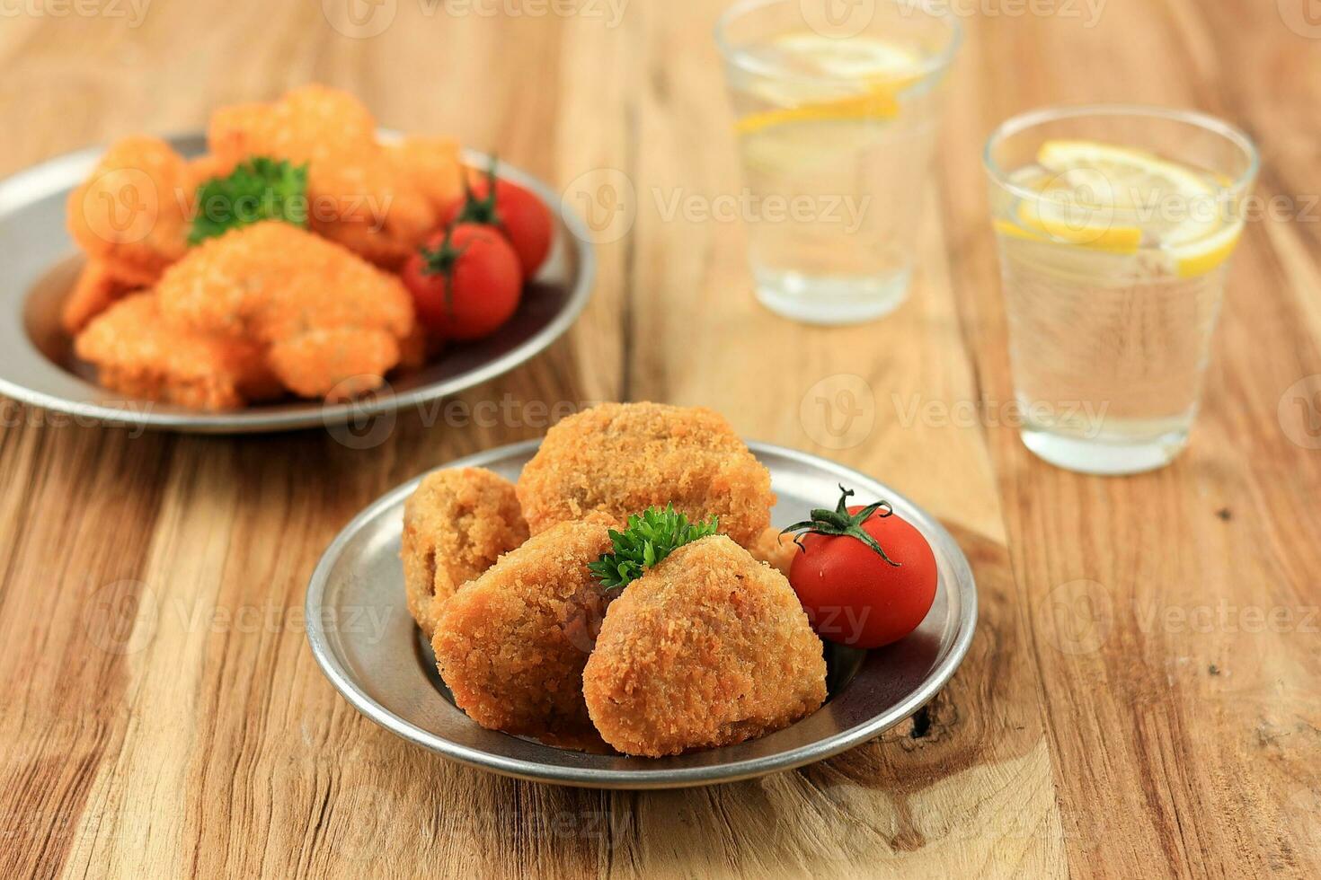 Crispy Instant Chicken Nugget Served with Fresh Lemon Water photo