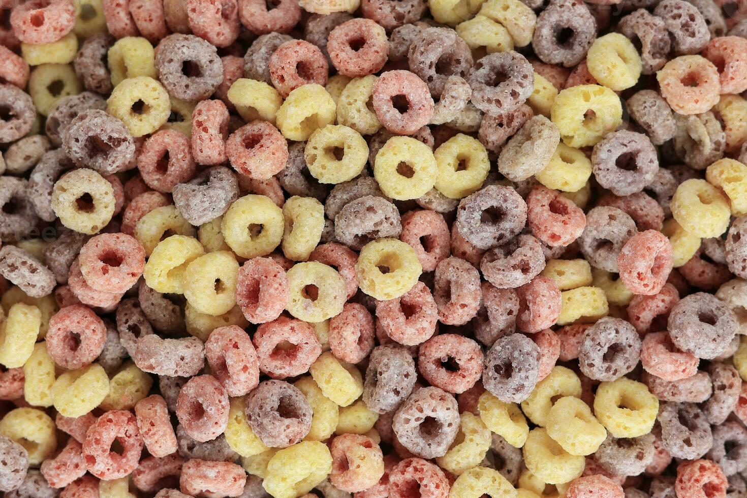 comida antecedentes de vistoso cereal anillo Fruta bucles foto