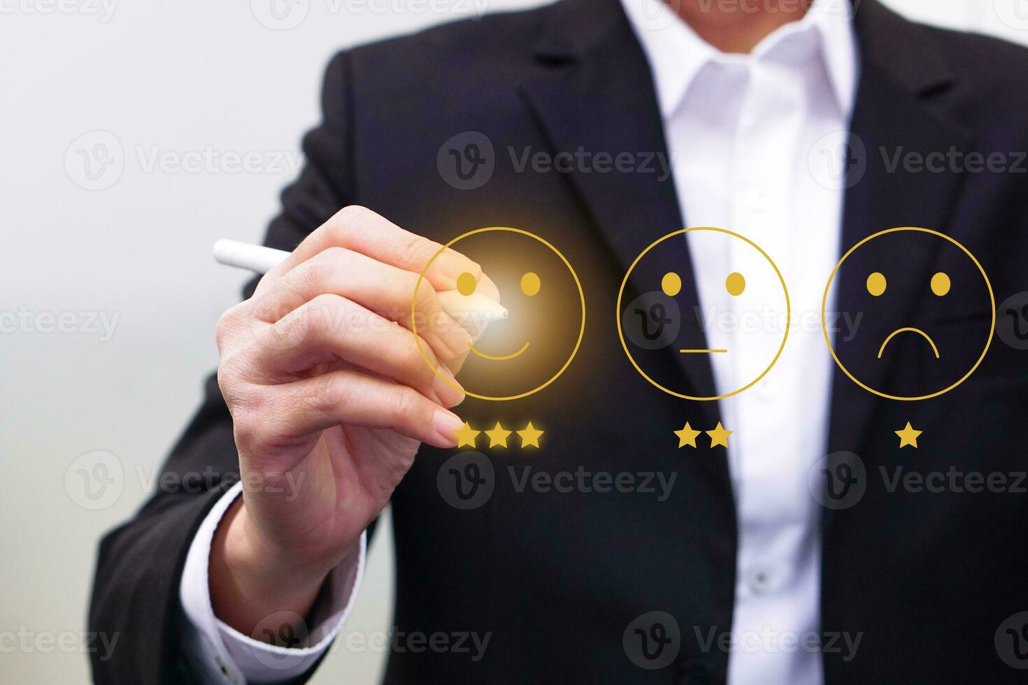 Businessman give rating satisfaction using a stylus pen. Evaluate quality of service and feedback survey concept. photo