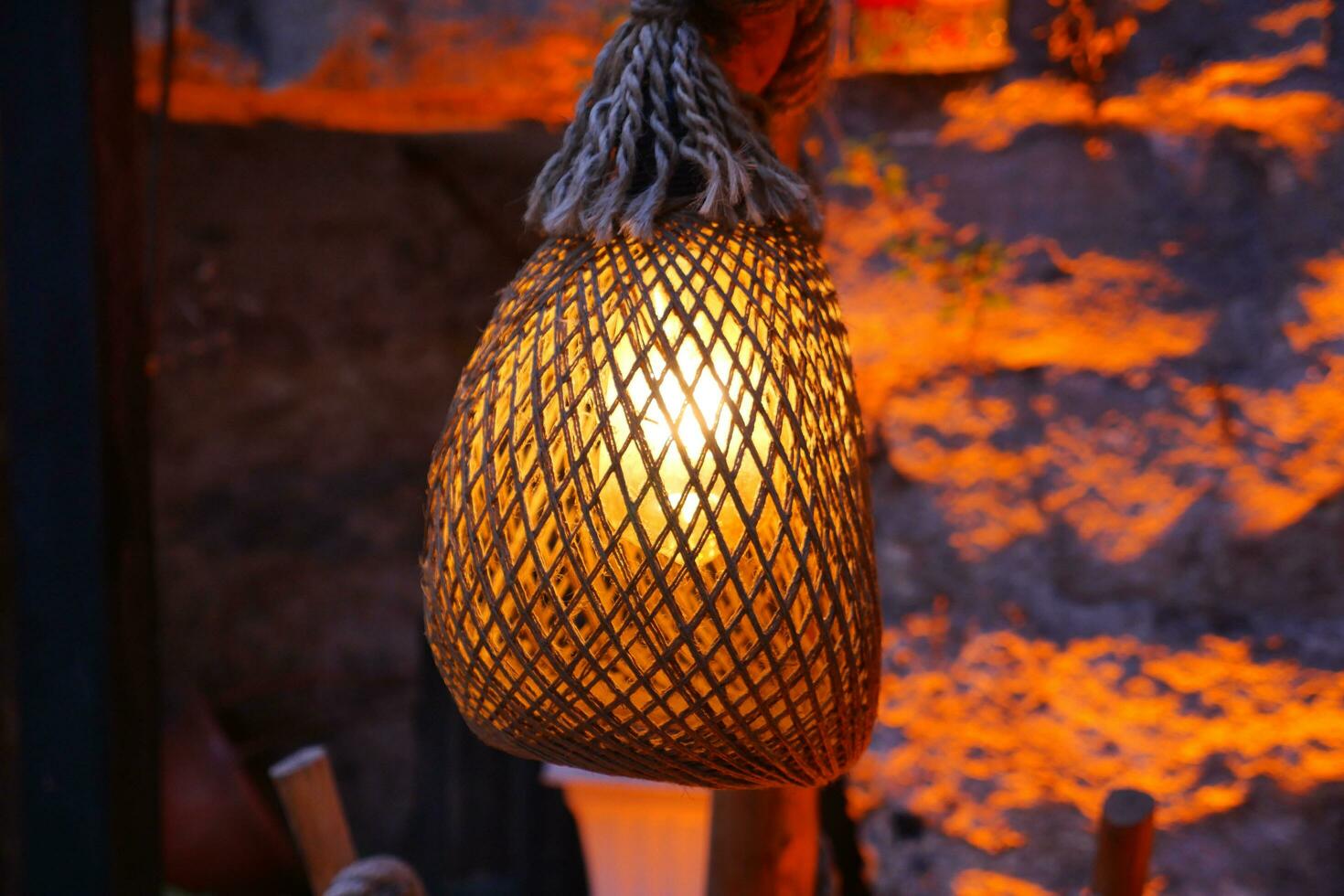 vintage lantern lamp against a wall photo