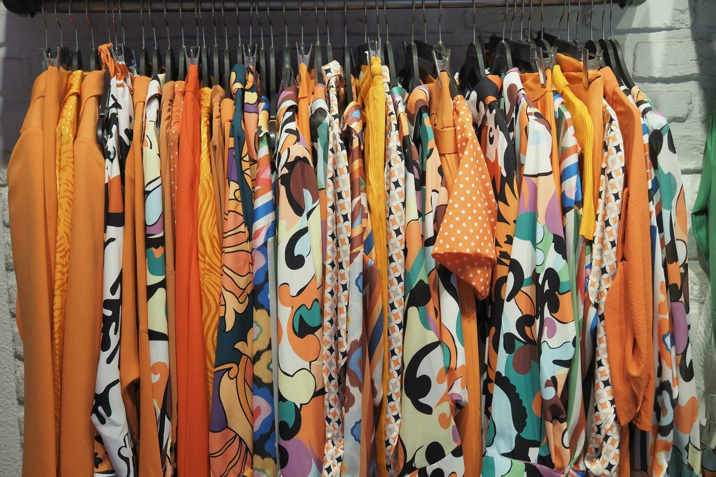 close up of many women cloths display for sale photo