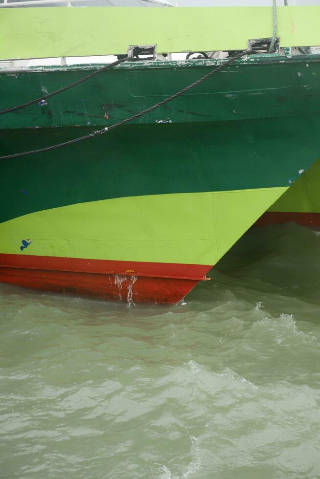 closeup of Boat and water wave photo