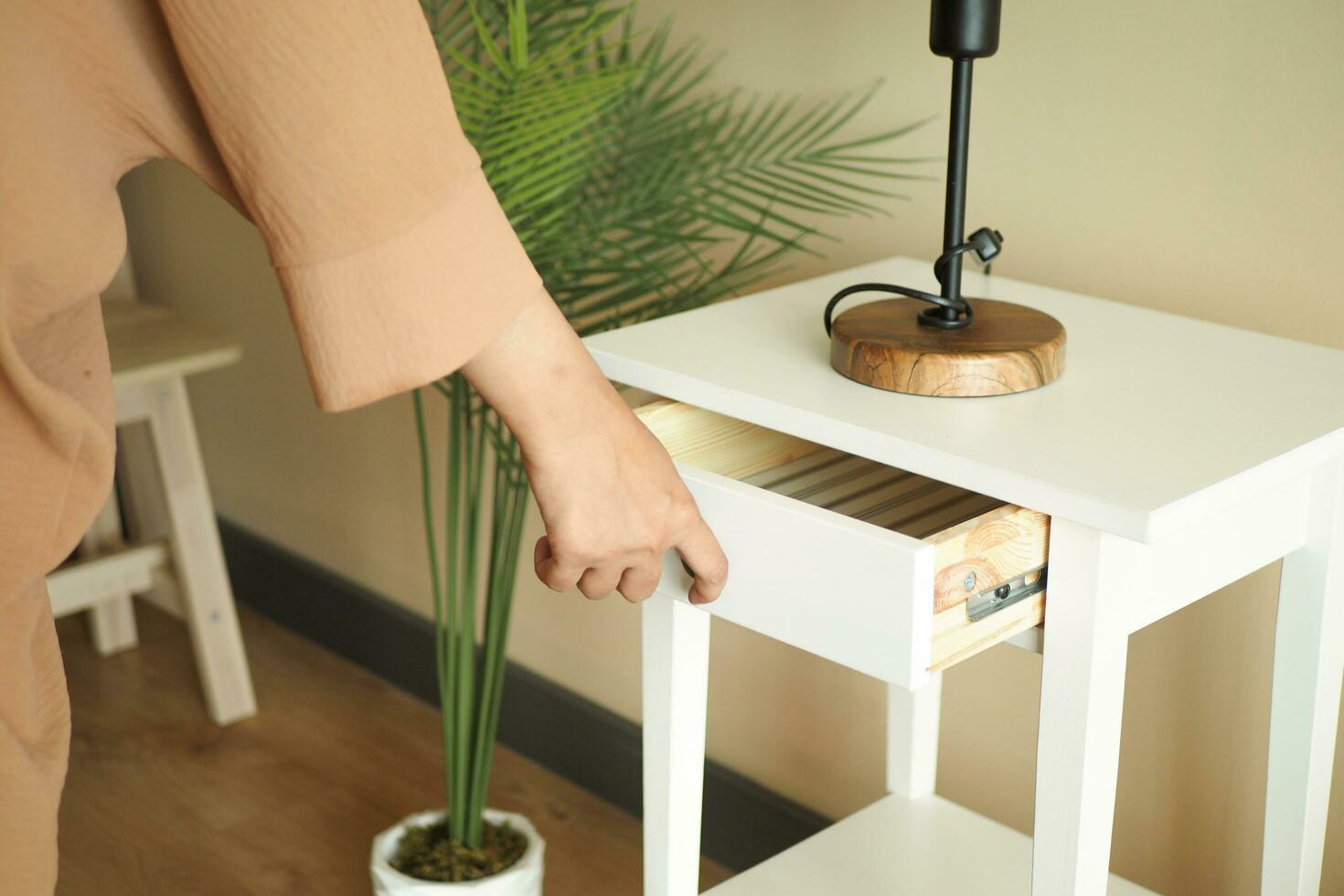 women hand open a a drawer photo