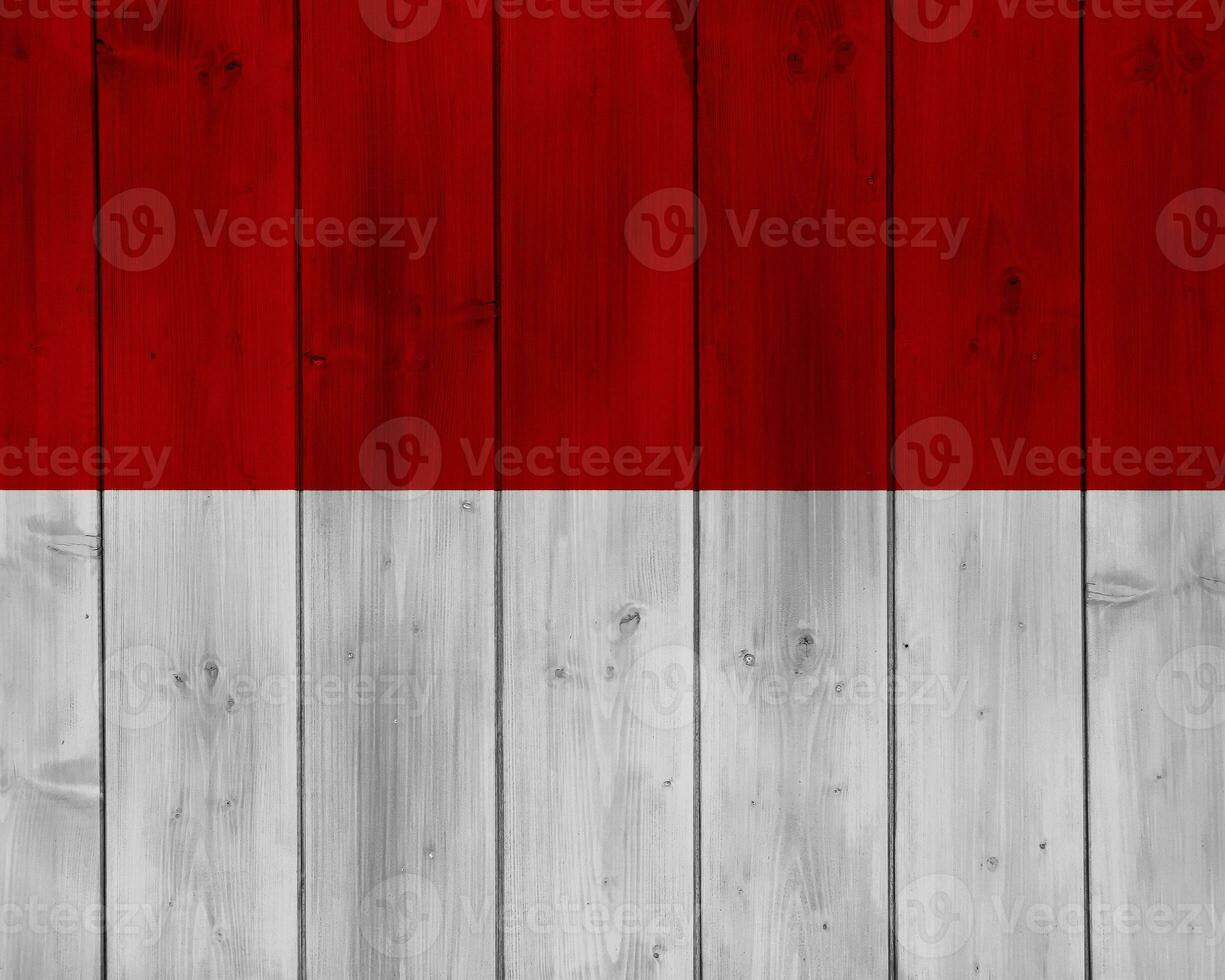 Flag of Principality of Monaco on a textured background. Concept collage. photo