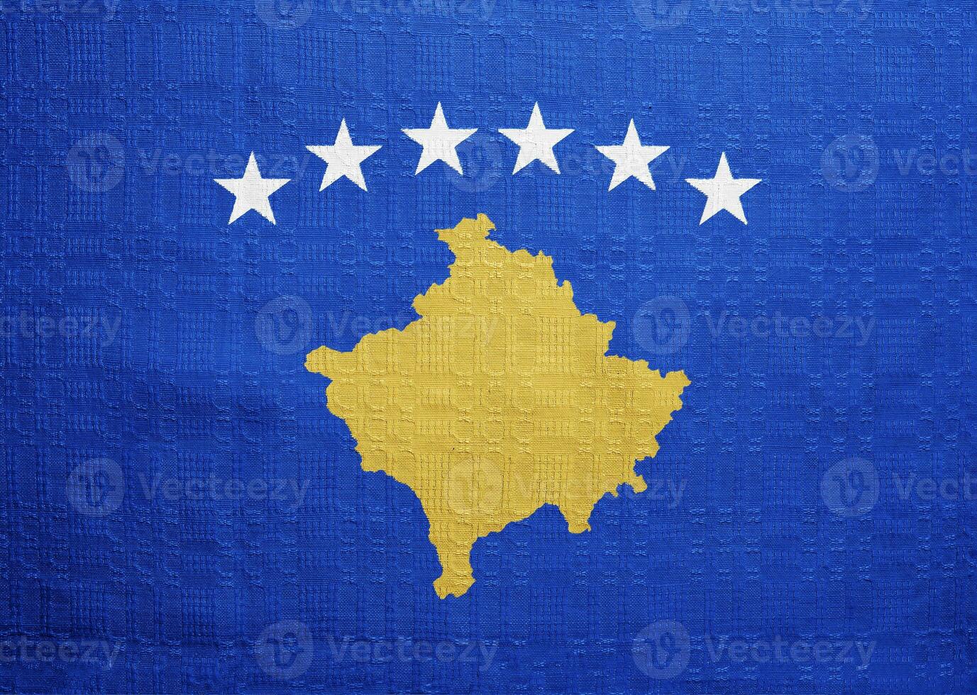 Flag of Republic of Kosovo on a textured background. Concept collage. photo