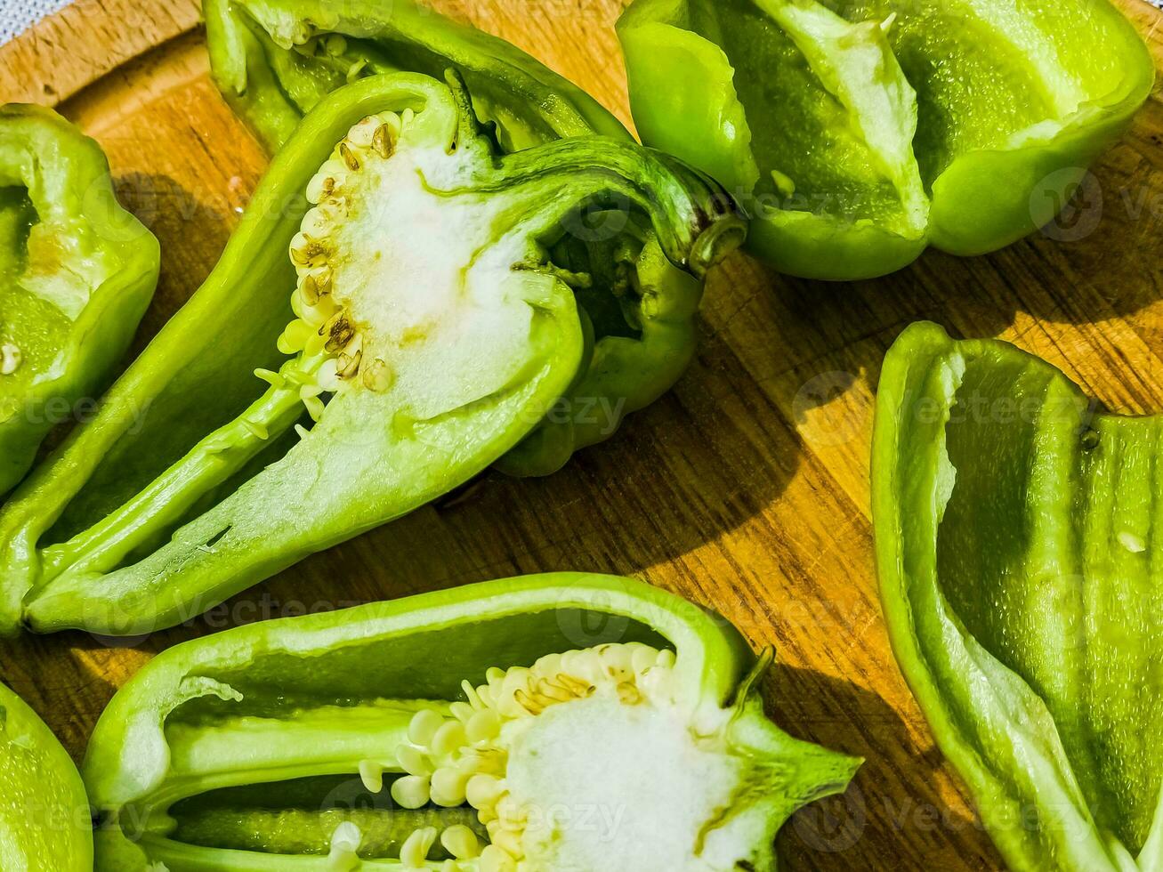 Organically grown green fresh bell pepper. Healthy food concept. photo