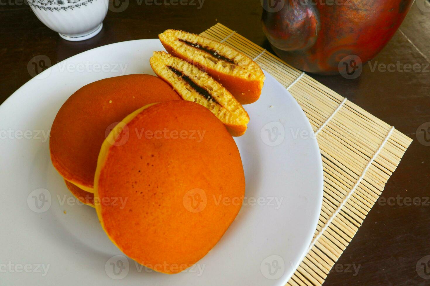 Dorayaki. Japanese bean paste pancake on a white background. Dorayaki is a cake that comes from Japan photo