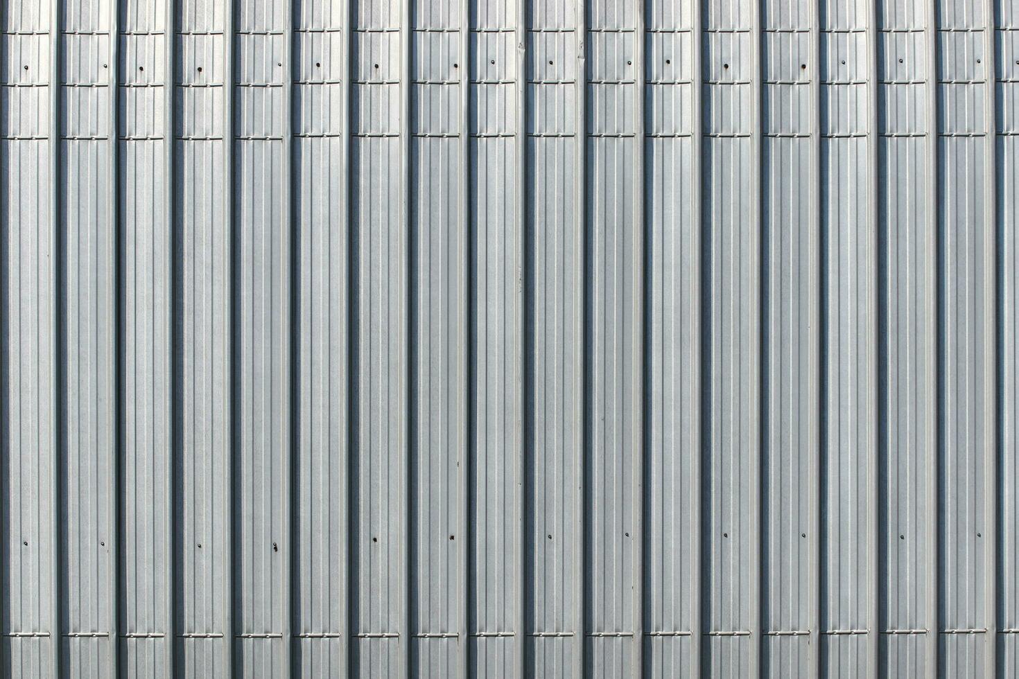 Silver abstract pattern from metal sheet. photo