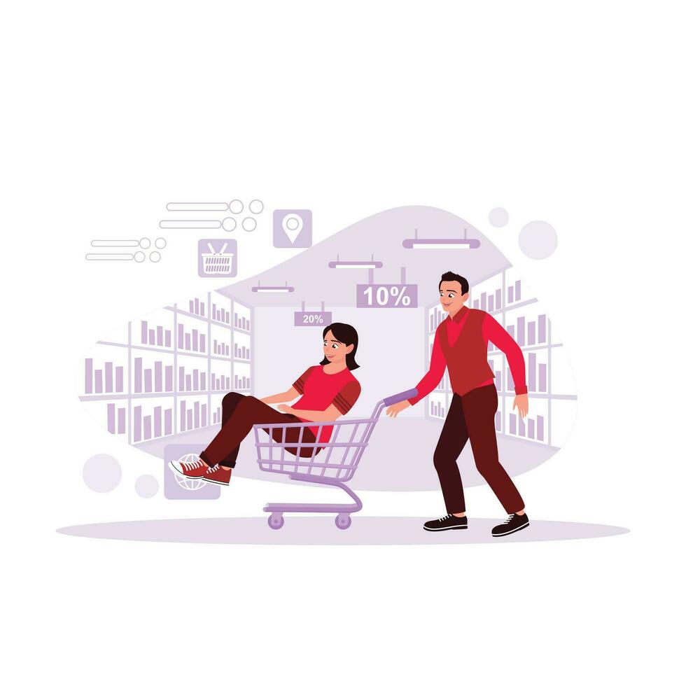 Happy couple in a shopping mall, a girl sitting on a trolley being pushed by the male couple. Trend Modern vector flat illustration.