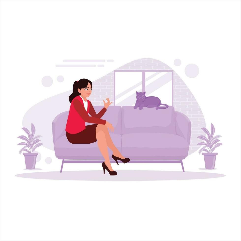 The female worker is relaxing on the sofa and playing with the cat sitting on the sofa. Trend modern vector flat illustration.