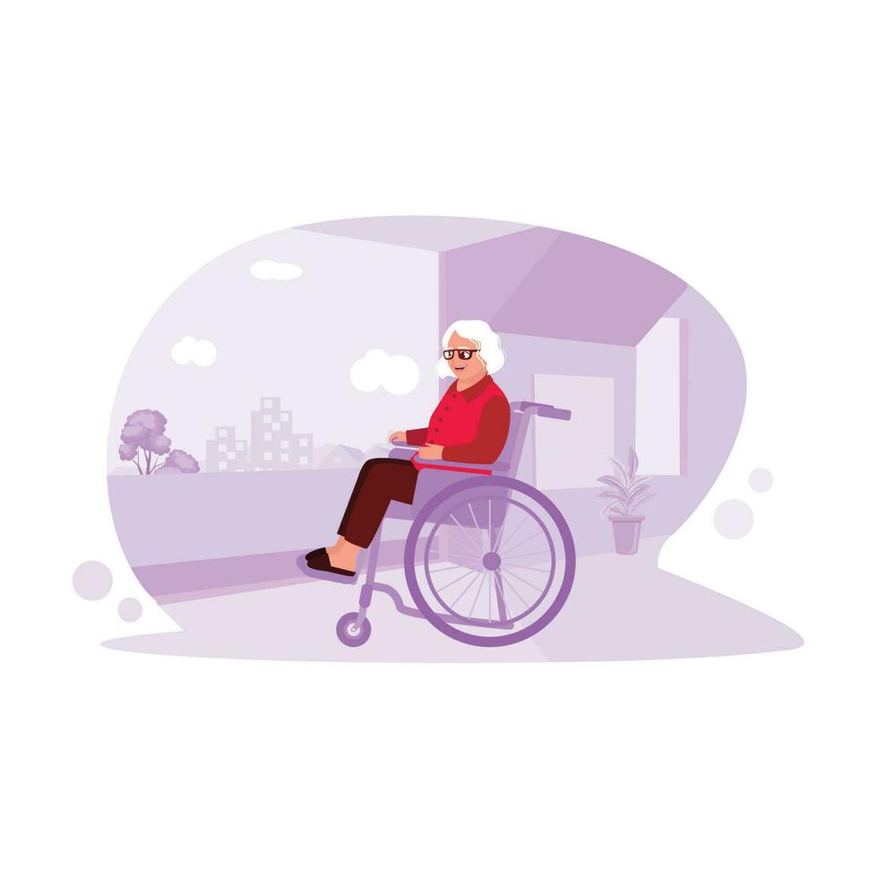 Portrait of an older woman in glasses sitting in a wheelchair, looking out the window and smiling happily with a positive aura. Trend Modern vector flat illustration.