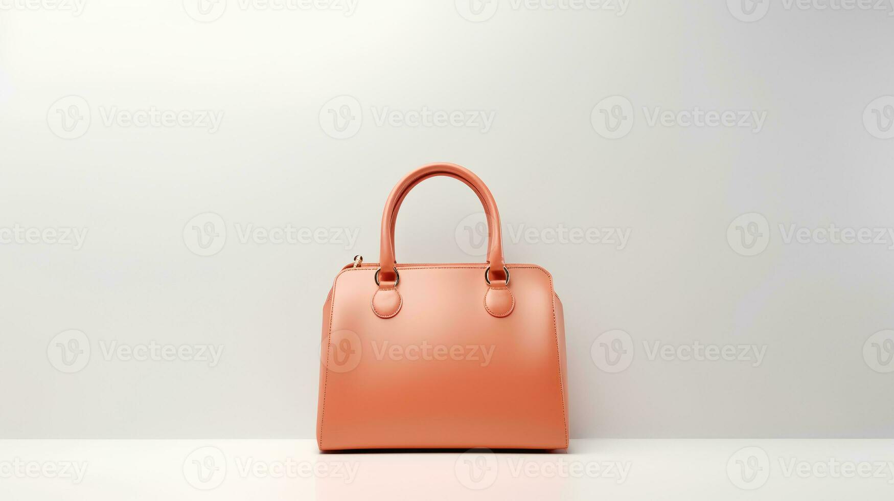 Photo of Minimalist peach female leather bag isolated on white background