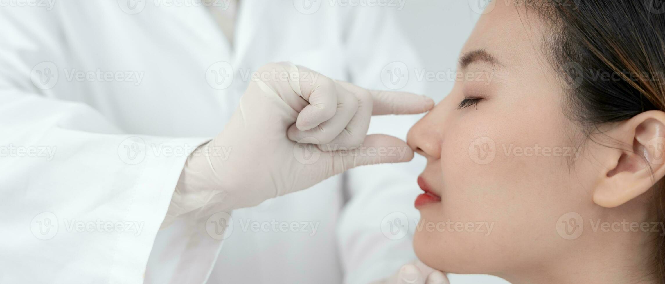 plastic surgery, beauty, Surgeon or beautician touching woman face, surgical procedure that involve altering shape of nose, doctor examines patient nose before rhinoplasty, medical assistance, health photo