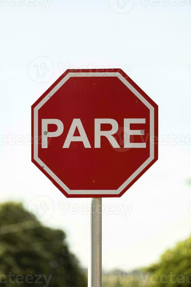 traffic stop sign in portuguese 26760282 Stock Photo at Vecteezy