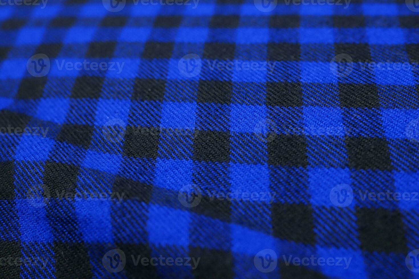 Background texture of blue plaid flannel fabric photo