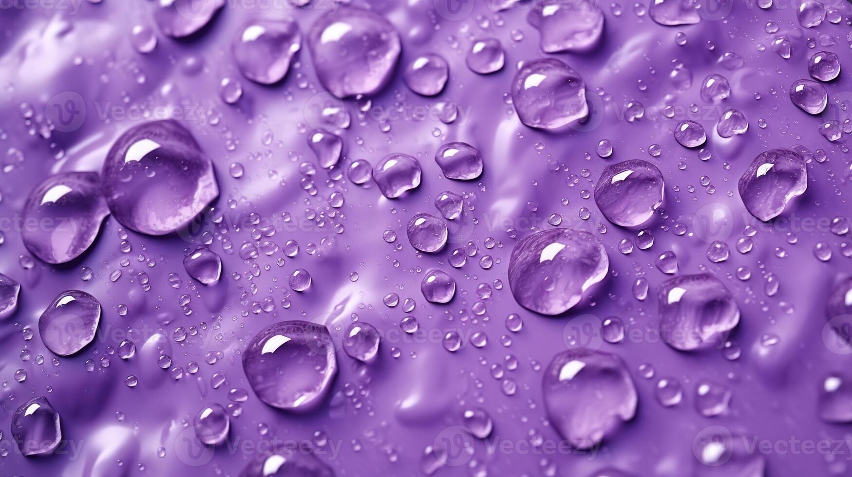 , Lavender color. Texture of light violet purple gel with drops and waves on soft background. Liquid beauty product closeup photo