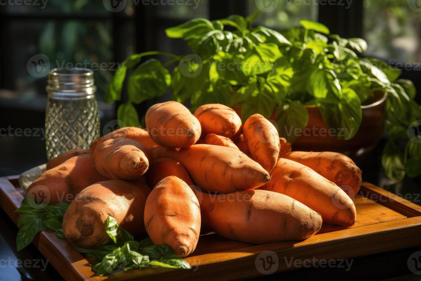 Raw sweet potatoes whole and cut. photo
