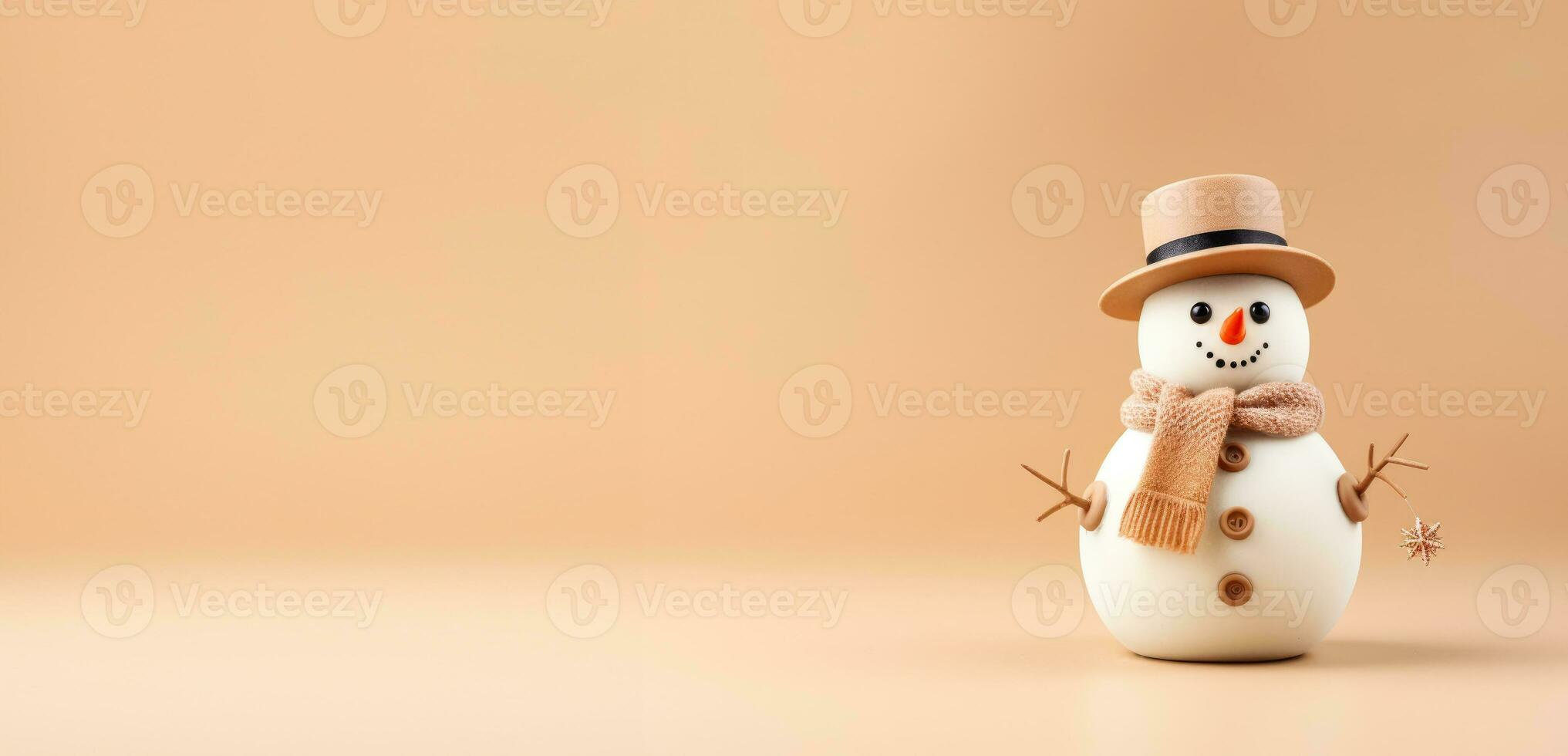 Cute fashionable snowman isolated on pastel background photo