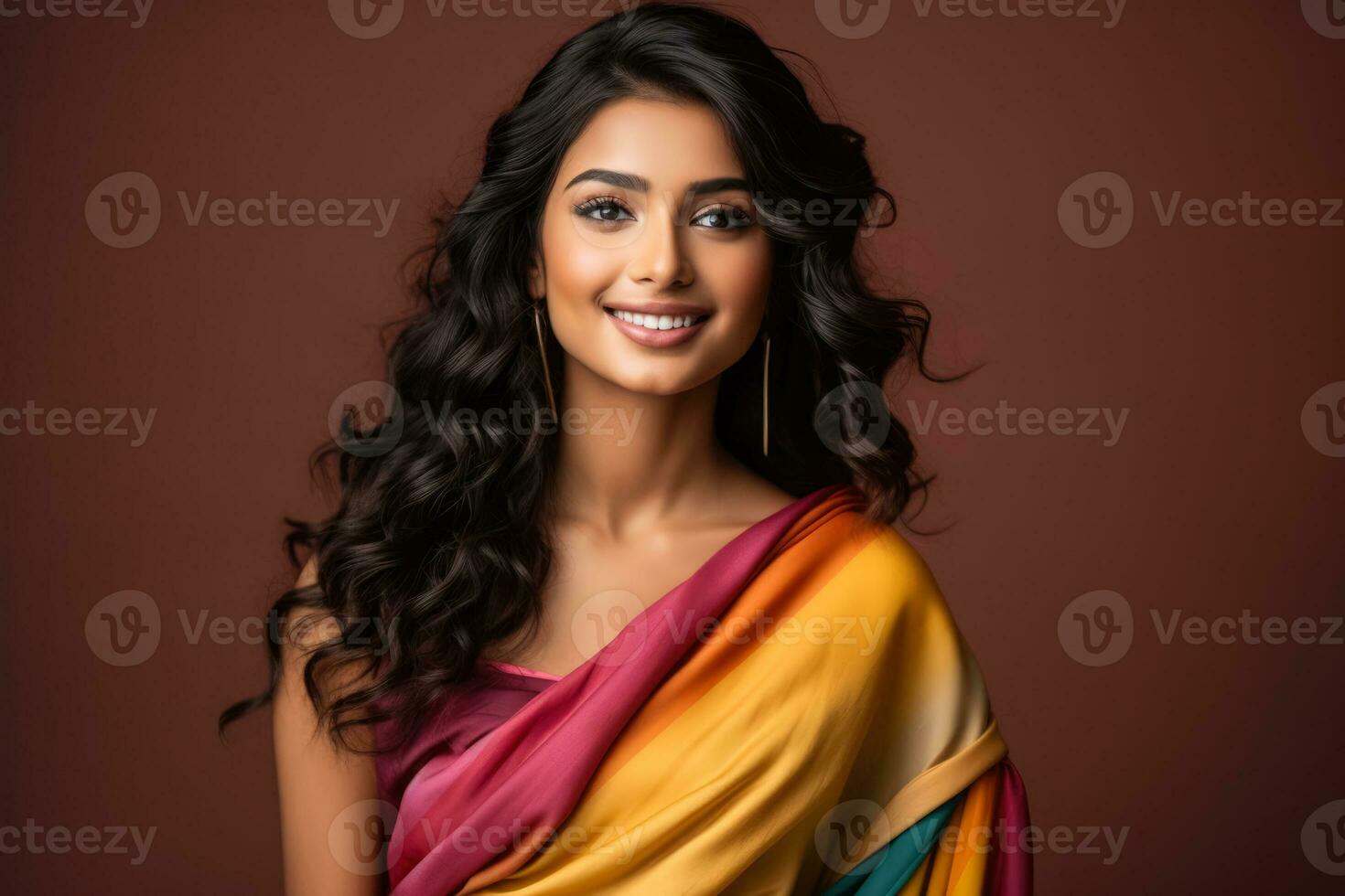 Young Indian woman in a colorful saree  photo with empty space for text