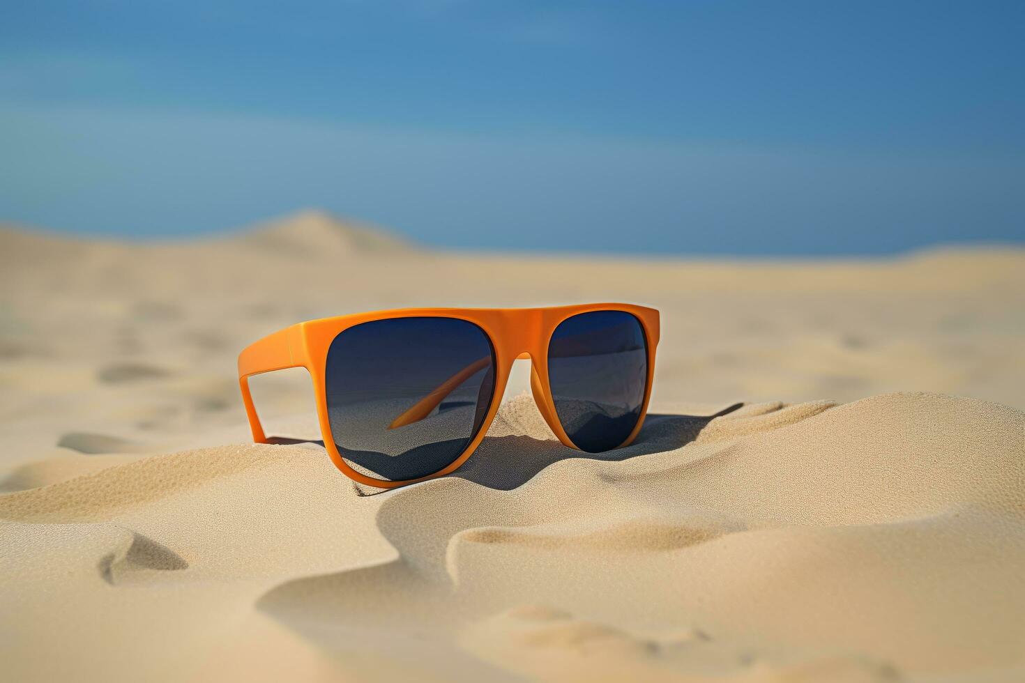 Sunglasses on a sandy island photo