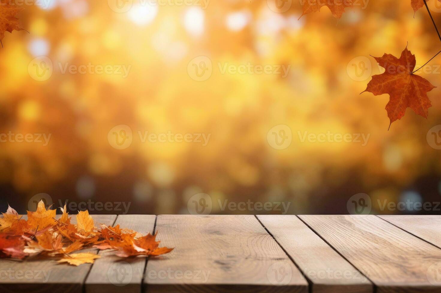 Wooden table with orange autumn leaves. Autumn background photo