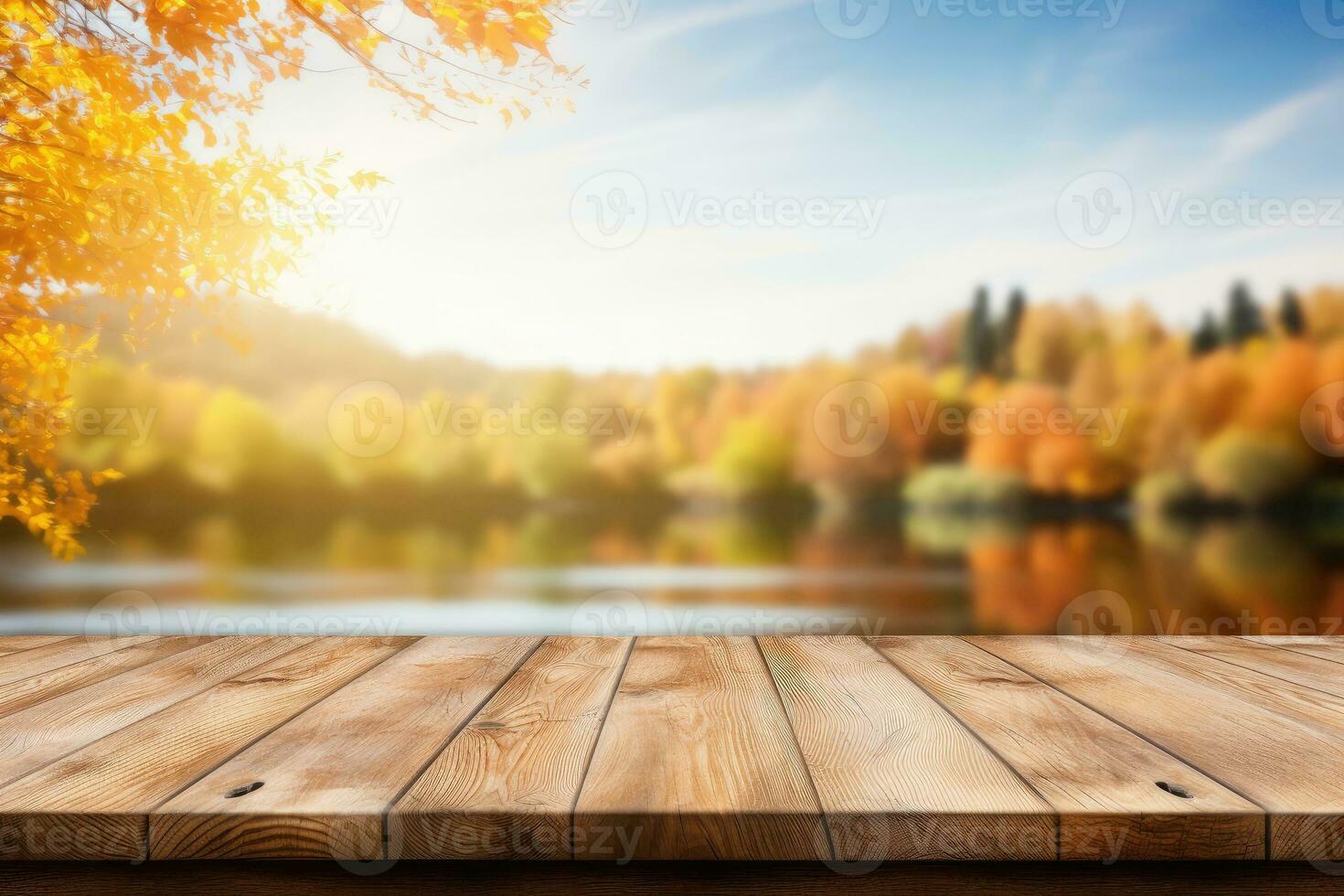 Old wooden table for product display with natural autumn landscape background. photo