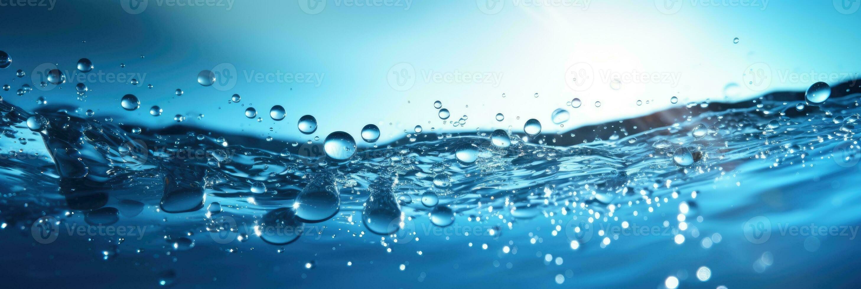 Closeup of bubbling water with water drops splashing up photo
