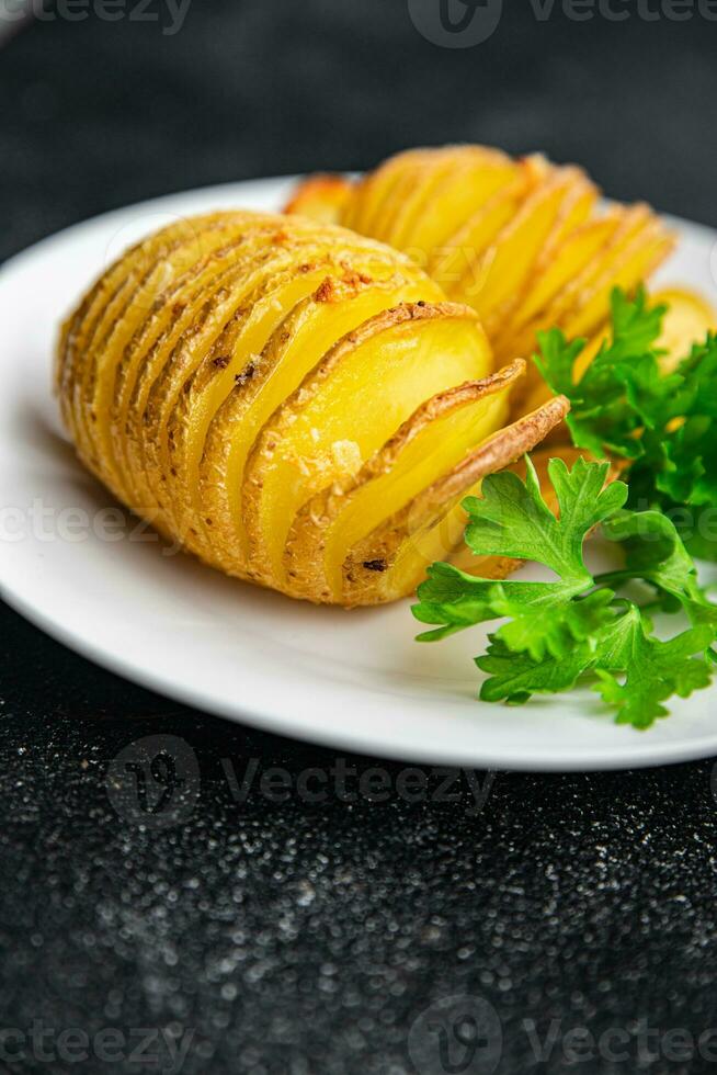 baked potato slice accordion vegetable meal food snack on the table copy space food background rustic top view photo