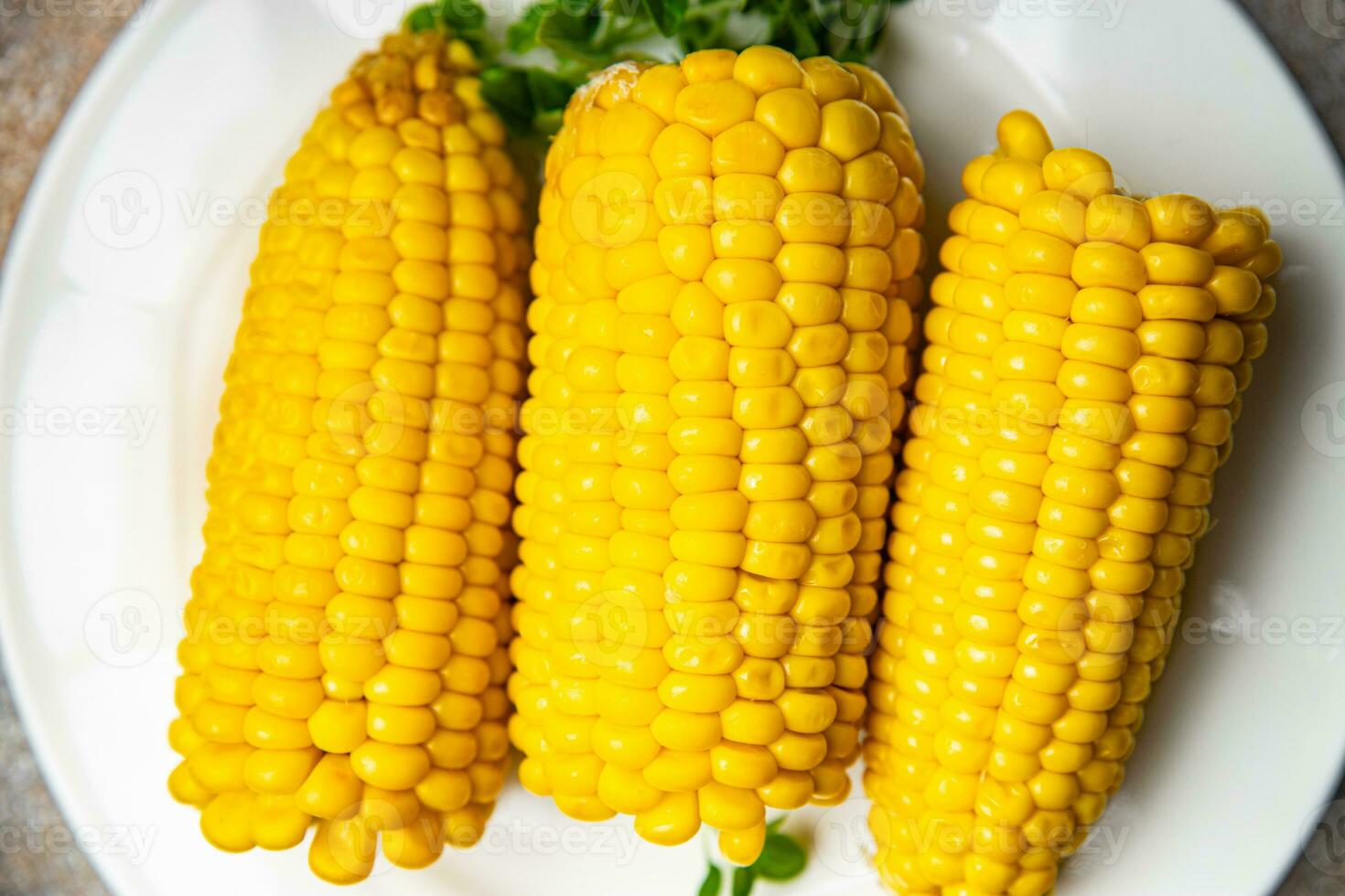 boiled corn ready to eat cob corn cooked vegetable food healthy meal food snack on the table copy space food background rustic top view keto or paleo diet photo