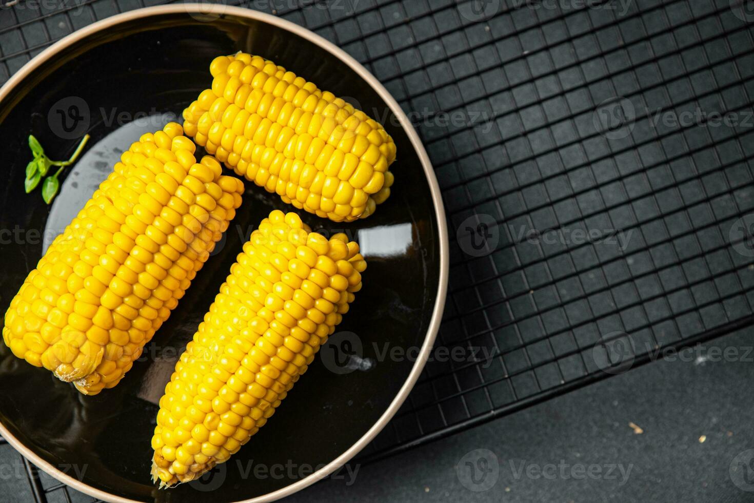 boiled corn ready to eat cob corn cooked vegetable food healthy meal food snack on the table copy space food background rustic top view keto or paleo diet photo