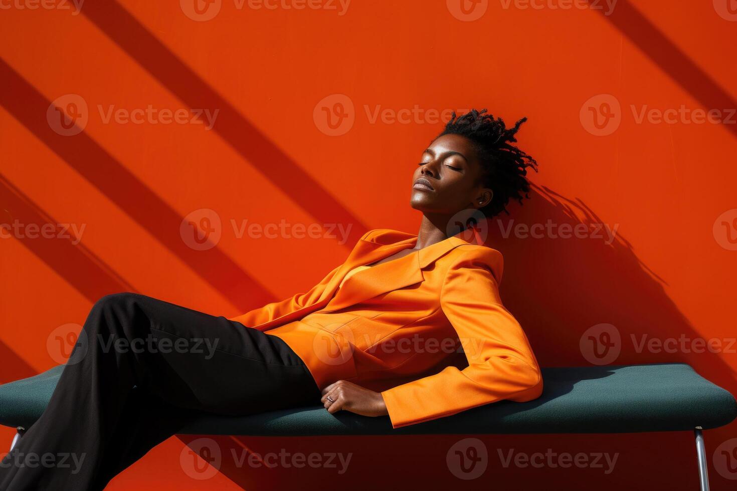 Fashion portrait of black woman on bright background. photo
