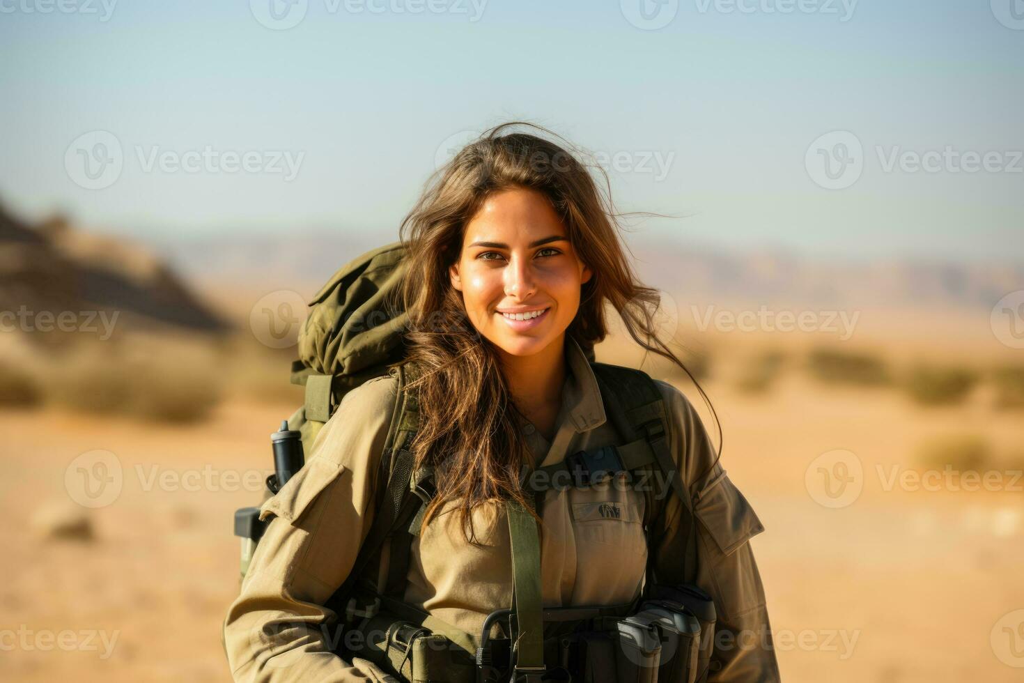 Female Israeli soldier in a desert training  photo with empty space for text