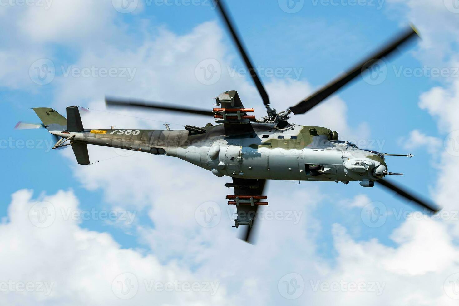 Untitled military helicopter at air base. Air force and army flight transportation. Aviation and rotorcraft. Transport and airlift. Military industry. photo