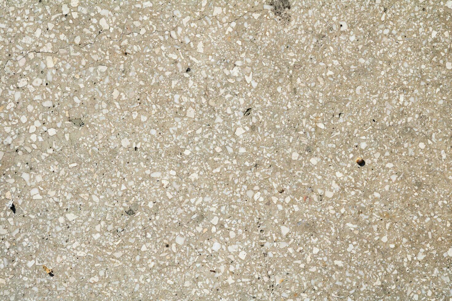 Cracked and abstract grunge texture. Aged material surface backdrop. Weathered effect pattern. Old and dirty background. photo